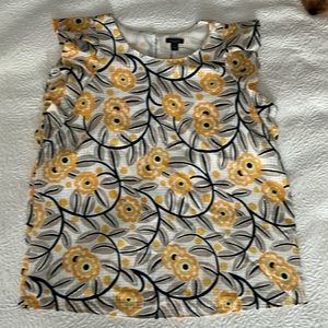 Ann Taylor EUC yellow/navy floral top. Fully lined, ruffle sleeve. Size M